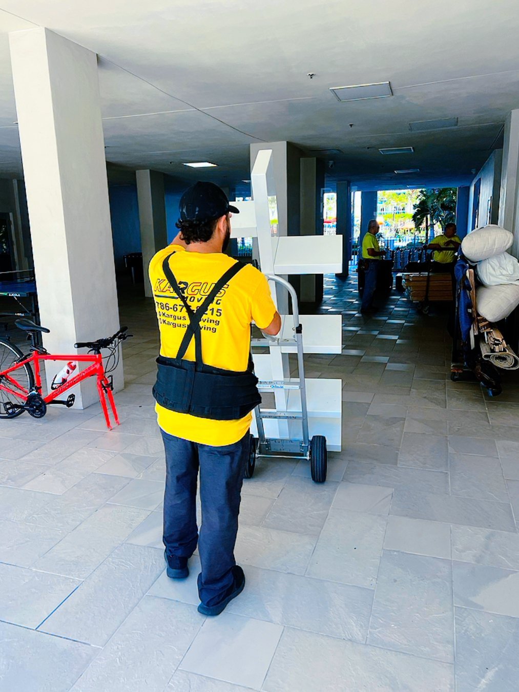 Kargus local movers in yellow shirts working in Miami