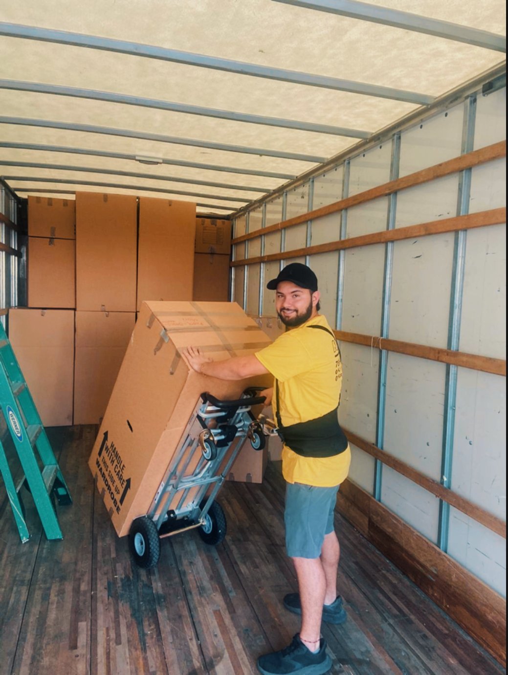Kargus crew wrapping furniture for a commercial move